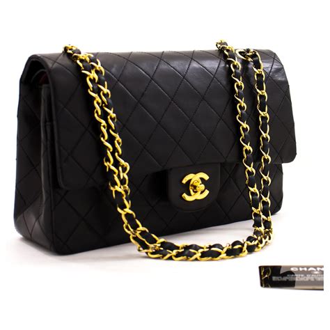 chanel flap bag with black chain|Black Chanel leather shoulder bag.